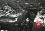 Image of US Army soldiers prepare for gas attack in World War 1 trench France, 1918, second 21 stock footage video 65675021500