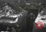 Image of US Army soldiers prepare for gas attack in World War 1 trench France, 1918, second 24 stock footage video 65675021500