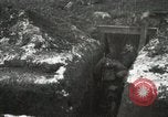 Image of US Army soldiers prepare for gas attack in World War 1 trench France, 1918, second 25 stock footage video 65675021500