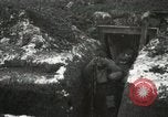 Image of US Army soldiers prepare for gas attack in World War 1 trench France, 1918, second 26 stock footage video 65675021500