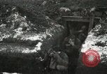 Image of US Army soldiers prepare for gas attack in World War 1 trench France, 1918, second 27 stock footage video 65675021500