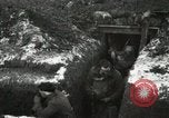 Image of US Army soldiers prepare for gas attack in World War 1 trench France, 1918, second 28 stock footage video 65675021500