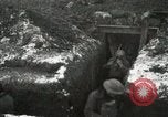 Image of US Army soldiers prepare for gas attack in World War 1 trench France, 1918, second 29 stock footage video 65675021500