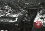 Image of US Army soldiers prepare for gas attack in World War 1 trench France, 1918, second 31 stock footage video 65675021500