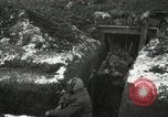 Image of US Army soldiers prepare for gas attack in World War 1 trench France, 1918, second 32 stock footage video 65675021500