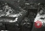 Image of US Army soldiers prepare for gas attack in World War 1 trench France, 1918, second 33 stock footage video 65675021500