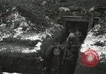 Image of US Army soldiers prepare for gas attack in World War 1 trench France, 1918, second 40 stock footage video 65675021500