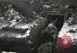 Image of US Army soldiers prepare for gas attack in World War 1 trench France, 1918, second 41 stock footage video 65675021500