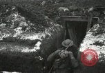 Image of US Army soldiers prepare for gas attack in World War 1 trench France, 1918, second 42 stock footage video 65675021500