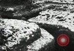 Image of US Army soldiers prepare for gas attack in World War 1 trench France, 1918, second 43 stock footage video 65675021500