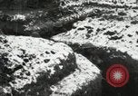 Image of US Army soldiers prepare for gas attack in World War 1 trench France, 1918, second 44 stock footage video 65675021500