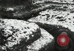 Image of US Army soldiers prepare for gas attack in World War 1 trench France, 1918, second 45 stock footage video 65675021500