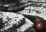 Image of US Army soldiers prepare for gas attack in World War 1 trench France, 1918, second 46 stock footage video 65675021500