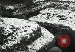 Image of US Army soldiers prepare for gas attack in World War 1 trench France, 1918, second 50 stock footage video 65675021500