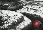 Image of US Army soldiers prepare for gas attack in World War 1 trench France, 1918, second 51 stock footage video 65675021500