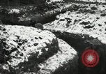 Image of US Army soldiers prepare for gas attack in World War 1 trench France, 1918, second 52 stock footage video 65675021500