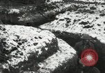 Image of US Army soldiers prepare for gas attack in World War 1 trench France, 1918, second 55 stock footage video 65675021500