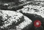 Image of US Army soldiers prepare for gas attack in World War 1 trench France, 1918, second 56 stock footage video 65675021500
