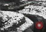 Image of US Army soldiers prepare for gas attack in World War 1 trench France, 1918, second 59 stock footage video 65675021500