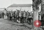 Image of United States troops march in French town in World War 1 France, 1918, second 33 stock footage video 65675021505