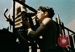 Image of 5 inch guns fired aboard USS Yorktown World War 2 Pacific Ocean, 1943, second 38 stock footage video 65675021554