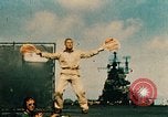 Standbild USS Yorktown Piloten zurück von Marcus Insel Bombardierung Pacific Theater, 1943, aus Sekunde 52 historischem Filmmaterial Videoclip 65675021558