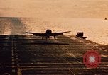 Immagine di Feriti US Navy piloti di atterraggio sulla USS Yorktown seconda guerra mondiale Truk Isole Caroline, 1944, secondo 57 filmato di repertorio 65675021561