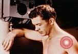 Image of USS Yorktown attacked by Japanese planes Battle of Philippine Sea Pacific Theater, 1944, second 1 stock footage video 65675021564
