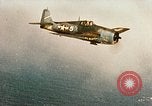 Image of wrecked planes and fire on USS Yorktown World War 2 Pacific Theater, 1944, second 5 stock footage video 65675021565