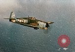Image of wrecked planes and fire on USS Yorktown World War 2 Pacific Theater, 1944, second 7 stock footage video 65675021565