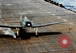 Image of wrecked planes and fire on USS Yorktown World War 2 Pacific Theater, 1944, second 13 stock footage video 65675021565
