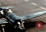 Image of wrecked planes and fire on USS Yorktown World War 2 Pacific Theater, 1944, second 14 stock footage video 65675021565