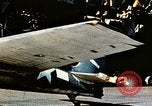 Image of wrecked planes and fire on USS Yorktown World War 2 Pacific Theater, 1944, second 27 stock footage video 65675021565