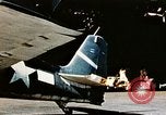 Image of wrecked planes and fire on USS Yorktown World War 2 Pacific Theater, 1944, second 28 stock footage video 65675021565