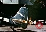 Image of wrecked planes and fire on USS Yorktown World War 2 Pacific Theater, 1944, second 29 stock footage video 65675021565