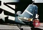 Image of wrecked planes and fire on USS Yorktown World War 2 Pacific Theater, 1944, second 30 stock footage video 65675021565
