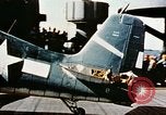 Image of wrecked planes and fire on USS Yorktown World War 2 Pacific Theater, 1944, second 31 stock footage video 65675021565