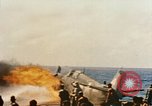 Image of wrecked planes and fire on USS Yorktown World War 2 Pacific Theater, 1944, second 32 stock footage video 65675021565