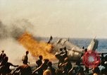 Image of wrecked planes and fire on USS Yorktown World War 2 Pacific Theater, 1944, second 34 stock footage video 65675021565