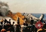 Image of wrecked planes and fire on USS Yorktown World War 2 Pacific Theater, 1944, second 36 stock footage video 65675021565