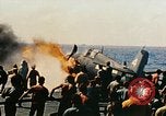Image of wrecked planes and fire on USS Yorktown World War 2 Pacific Theater, 1944, second 38 stock footage video 65675021565