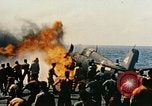 Image of wrecked planes and fire on USS Yorktown World War 2 Pacific Theater, 1944, second 40 stock footage video 65675021565
