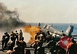 Image of wrecked planes and fire on USS Yorktown World War 2 Pacific Theater, 1944, second 41 stock footage video 65675021565