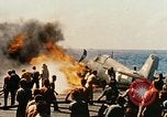 Image of wrecked planes and fire on USS Yorktown World War 2 Pacific Theater, 1944, second 42 stock footage video 65675021565