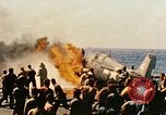 Image of wrecked planes and fire on USS Yorktown World War 2 Pacific Theater, 1944, second 43 stock footage video 65675021565