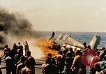 Image of wrecked planes and fire on USS Yorktown World War 2 Pacific Theater, 1944, second 44 stock footage video 65675021565
