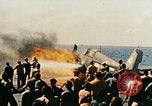 Image of wrecked planes and fire on USS Yorktown World War 2 Pacific Theater, 1944, second 45 stock footage video 65675021565