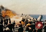 Image of wrecked planes and fire on USS Yorktown World War 2 Pacific Theater, 1944, second 46 stock footage video 65675021565