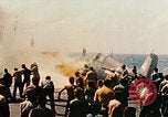 Image of wrecked planes and fire on USS Yorktown World War 2 Pacific Theater, 1944, second 47 stock footage video 65675021565