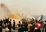 Image of wrecked planes and fire on USS Yorktown World War 2 Pacific Theater, 1944, second 48 stock footage video 65675021565